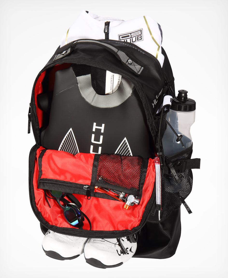 HUUB TT Bag – Transition Three, 40L rucksack, wet/dry, hidden helmet cradle, navy and olive/orange.