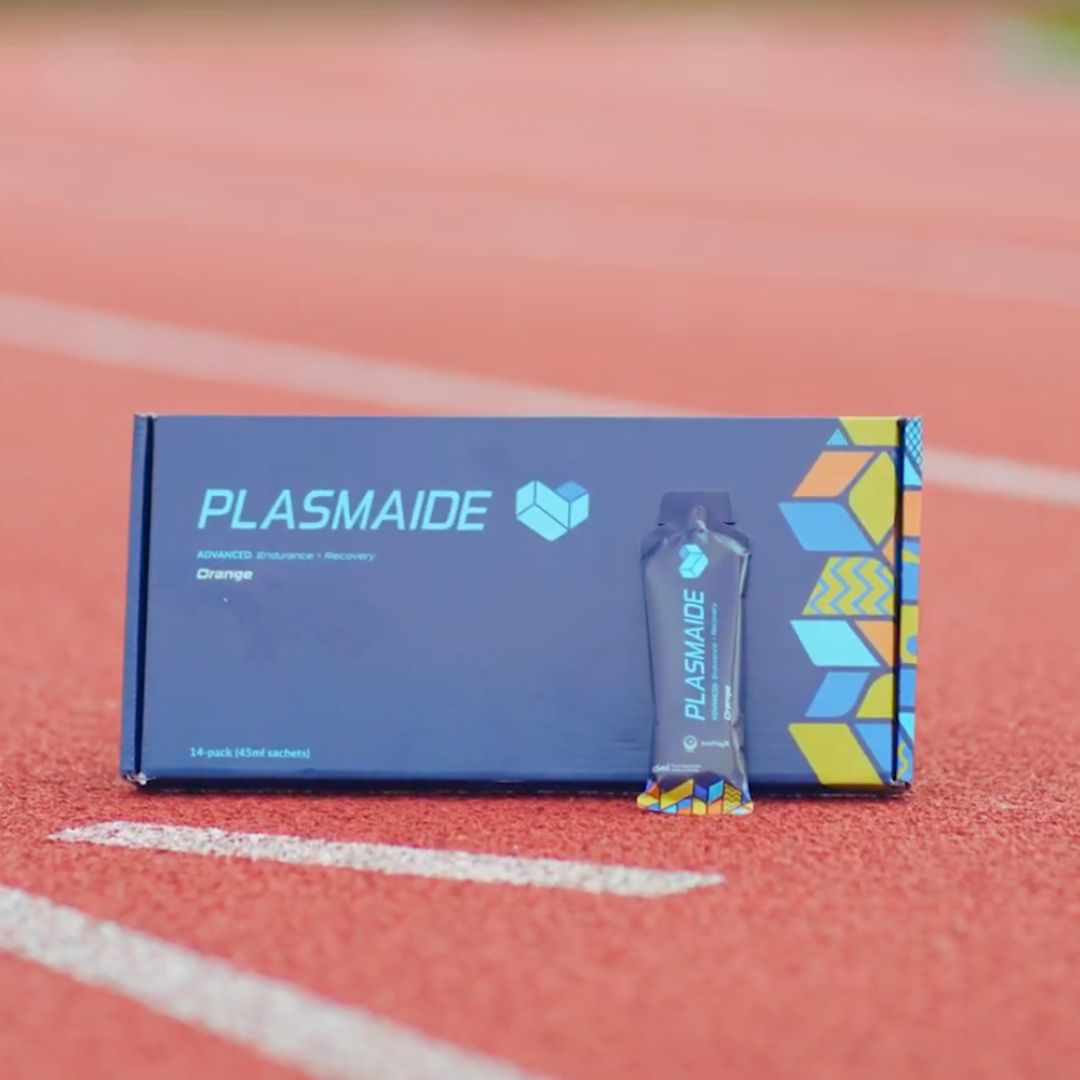 Fresh single-serve orange by Plasmaide showing bright orange peel and juicy interior, perfect for a healthy snack.